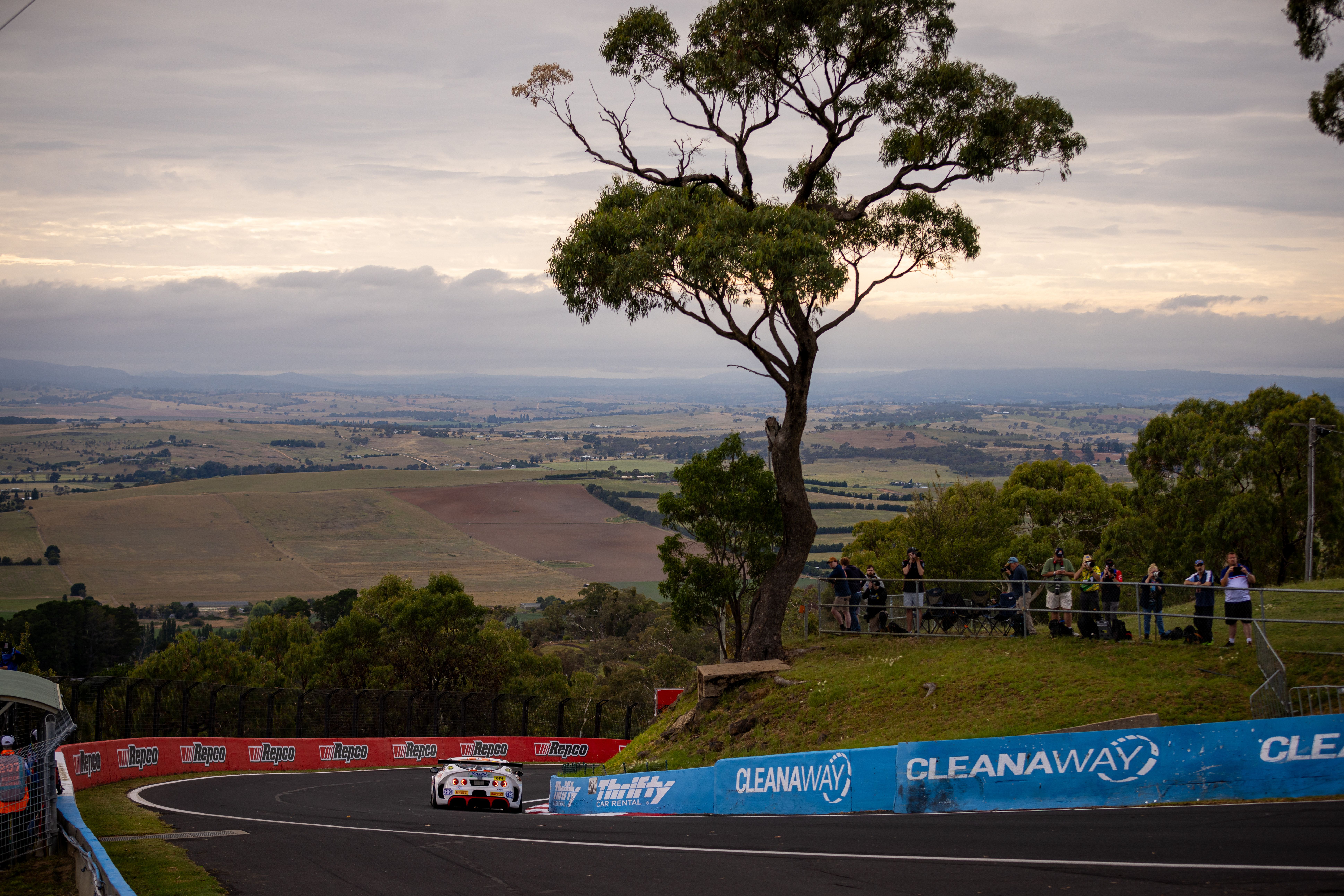 A race car descending Mount Panorama at Bathurst