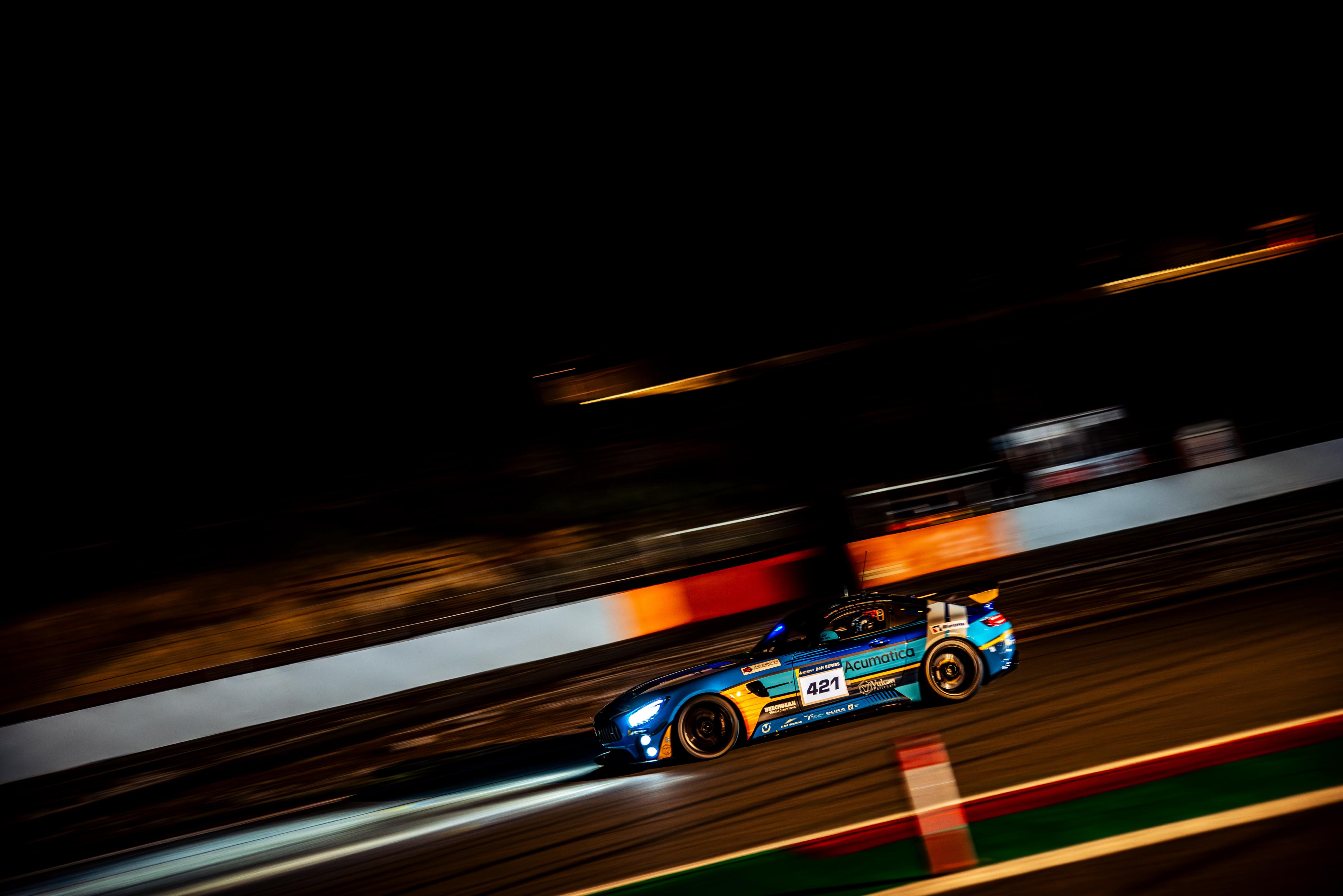 Owen Hizzey racing the Mercedes-AMG GT4 at night in Barcelona