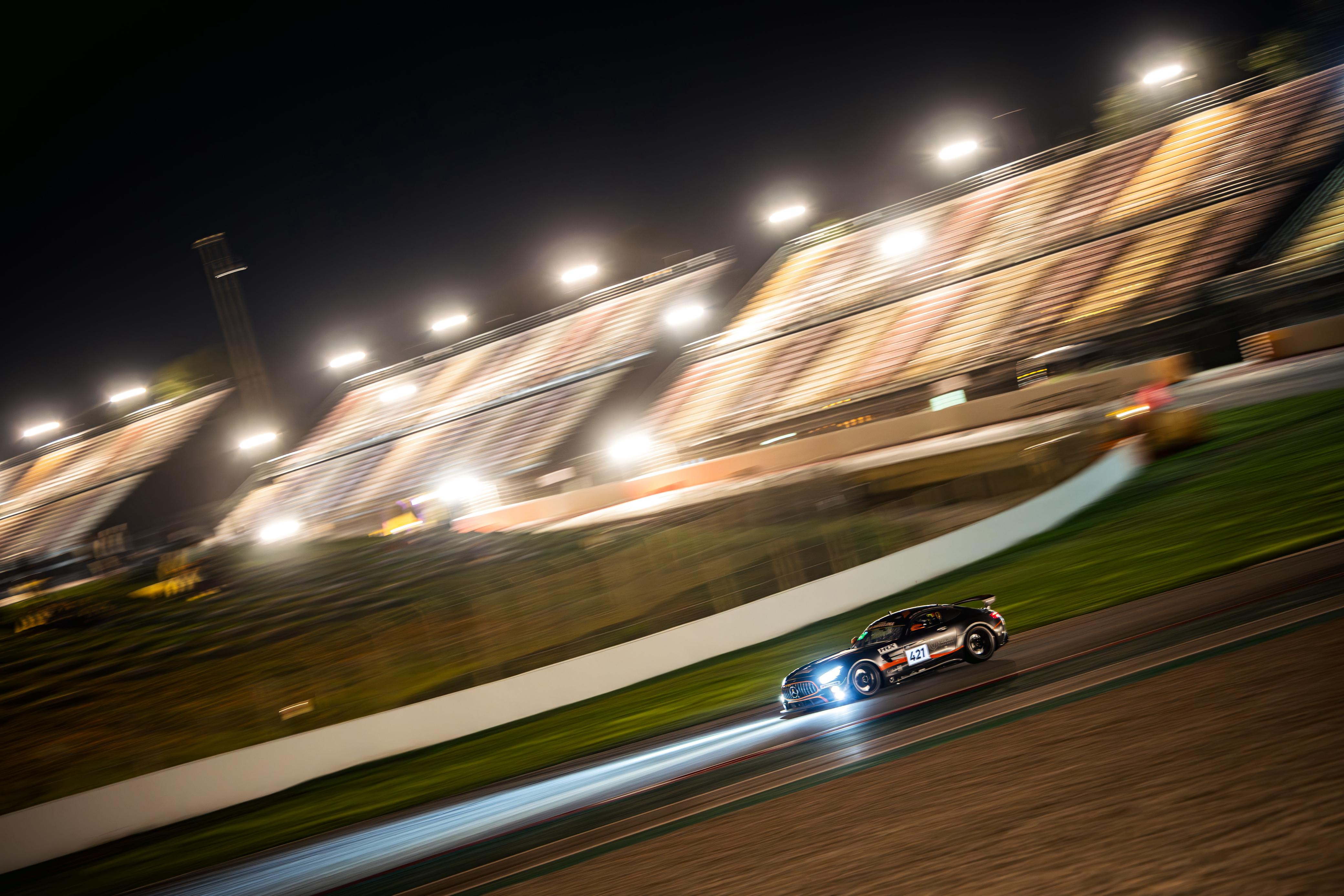 Owen Hizzey racing the Mercedes-AMG under the lights